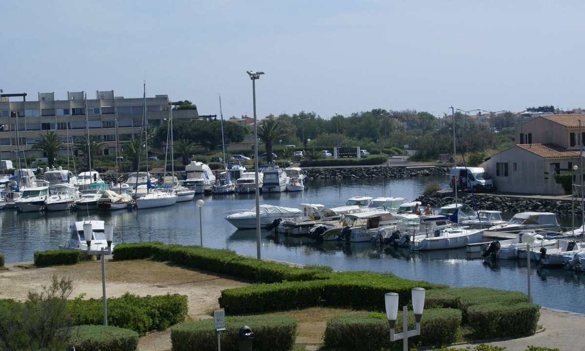 Naturist Village Apartment | Air-conditioned apartment with pool and secure parking
