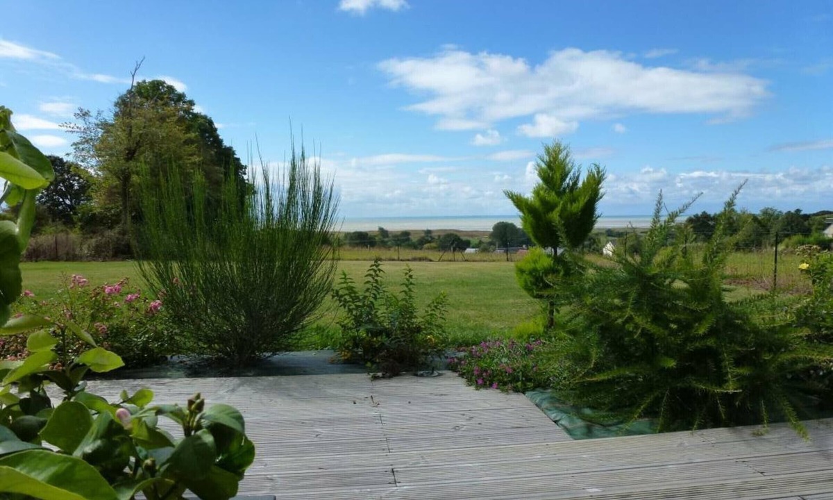 Dragey-Ronthon Cottage | Contemporary house with enclosed garden, terrace and bay views