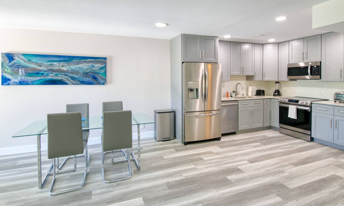 Palm Beach Shores Condo | Dog-friendly gem with furnished patio, hot tub, grill, fast WiFi & central AC