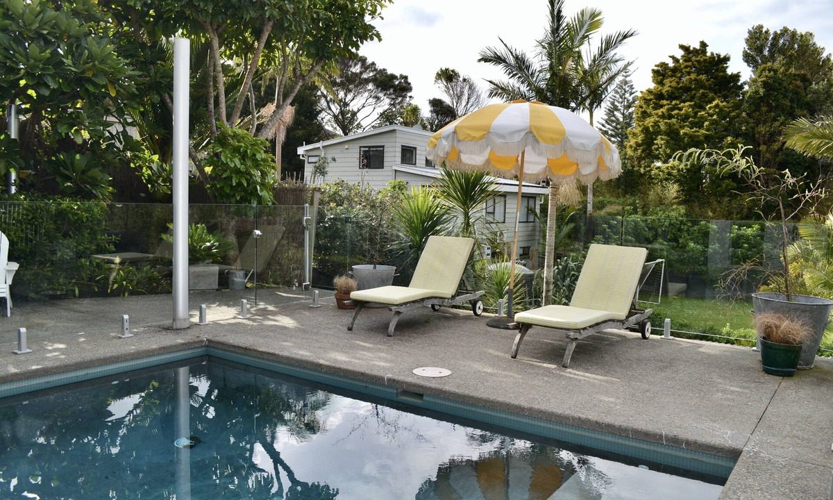 Stanmore Bay Apartment | Stanmore Bay apartment with a pool, gorgeous tropical garden & beach close by.