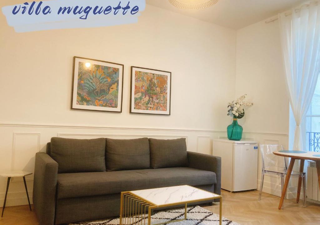 Cœur de Ville Apartment | Villa muguette - coeur de Vichy- RDC-véranda sur la terrasse