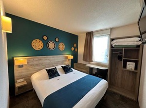 Brit Hotel | Distre