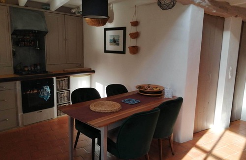 Bouin Cottage | a charming little house deep in a fenced garden with stone walls