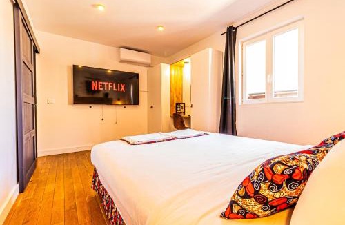 Quartier Administrations House | AfroBoHome, Expérience Atypique, clim, 2 à 6 personnes, Proche centre Nîmes, Garage clos