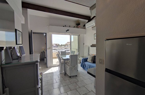 Naturist Village Apartment | Air-conditioned apartment with pool and secure parking