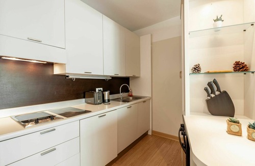 Santa Giulia Apartment | Beautiful apartment for 4 guests with pool, WIFI, A/C, TV and patio
