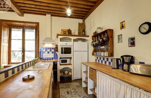 Sauvain Cottage | Charming Historical Cottage with Modern Amenities, Fireplace, and Garden in Scenic French Village