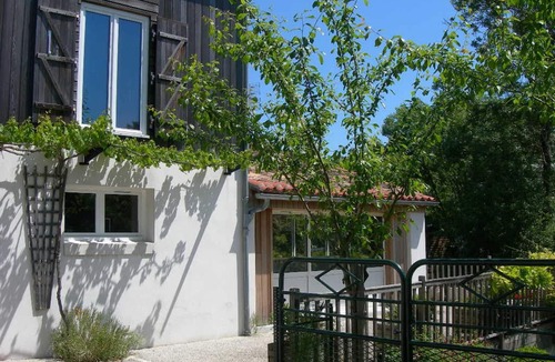 Damvix Cottage | Cozy Riverside Cottage with Canoes, Terrace & Garden in Charming Damvix