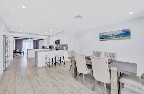 North Central Hollywood House | HEATED Pool Home on Lake Hard Rock Guitar Hotel Beach Airport