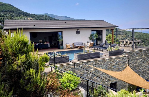 Pozzo Villa | House nestled in the maquis with breathtaking sea views.