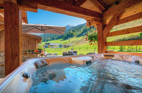 La Clusaz Ski Chalet | La Ferme à Juju - alpine ski-in ski-out for 8 spa & views - OVO Network
