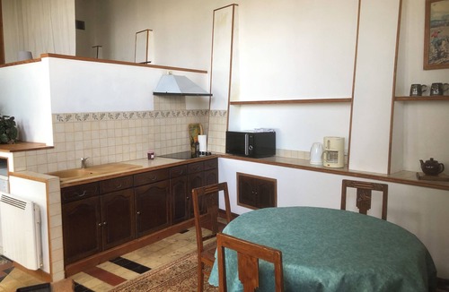 Cote Est Soquence Apartment | Loft-style apartment in a former orangery.