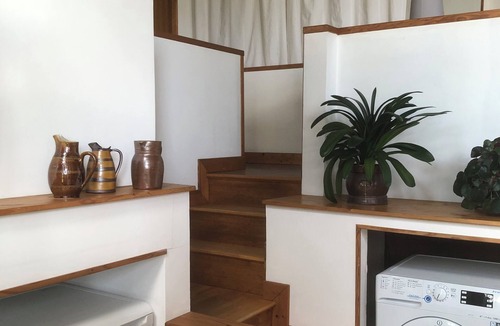 Cote Est Soquence Apartment | Loft-style apartment in a former orangery.