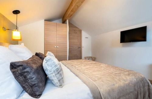 Meribel Centre Apartment | Résidence Pierre & Vacances Premium L'Hevana ***** - Apartment 8 people - 3 bedrooms - Fireplace - Sauna