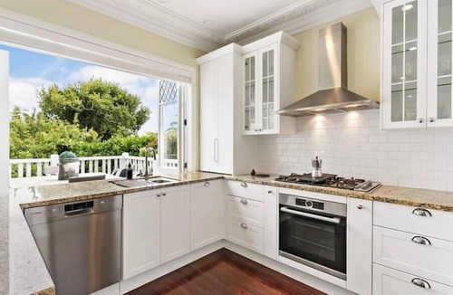 Mission Bay Cottage | Rose Cottage – Where Charm Meets Coastal Sophistication.