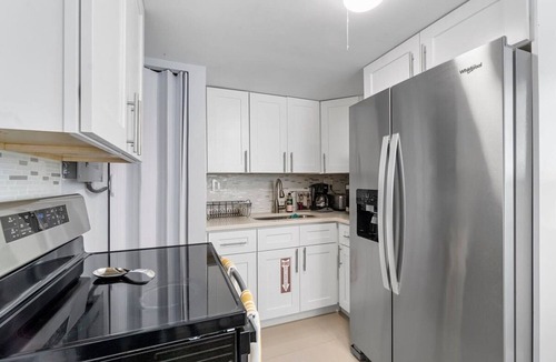 Dolphin Isles Apartment | Trendy Modern Haven, Just Steps from the Sea