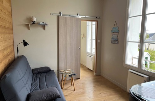 Langrune-sur-Mer Apartment | Waterfront apartment with your feet in the water!
