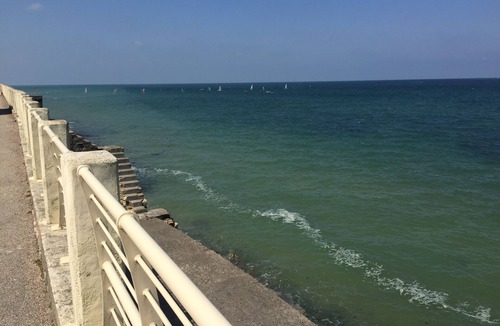 Langrune-sur-Mer Apartment | Waterfront apartment with your feet in the water!