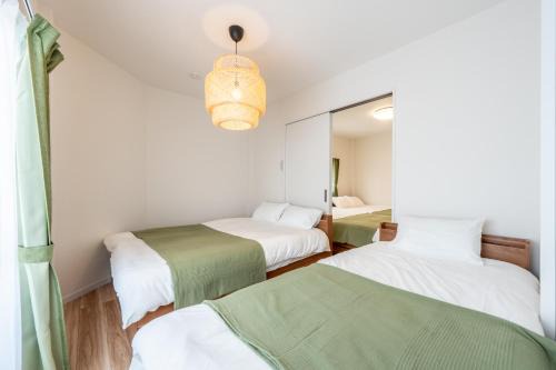 3 Free Rental Bicycles - Free Parking - 85sqm - Up to 9 Guests - 7min to Koreatown - Japanese Lessons by Professional teacher - 自転車3台無料貸出 - 無料駐車場 - 85平米 - 定員9名 - コリアタウン徒歩7分 - Mintak Katsuyama V Residence