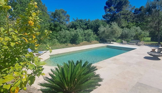 A stunning, air-conditioned property with a saltwater swimming pool and large wooded grounds, in.