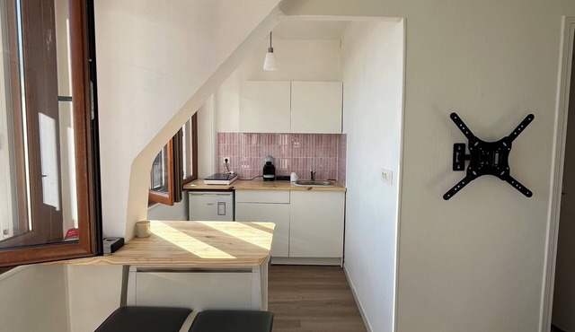 Apartment T1bis with private parking