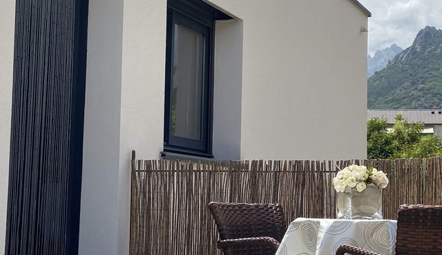 Casa ind'é noi: garden-level air-conditioned studio with parking space