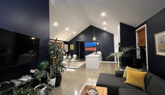 Chic, modern designer oasis on city fringe with large spa pool. Great kitchen!
