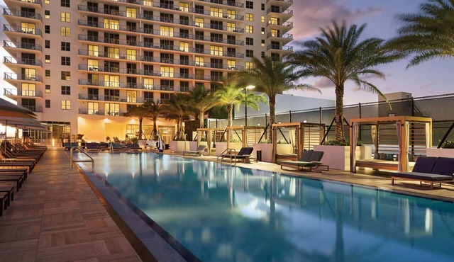 Direct Ocean Views + Rooftop Pool. Bar. Tennis.