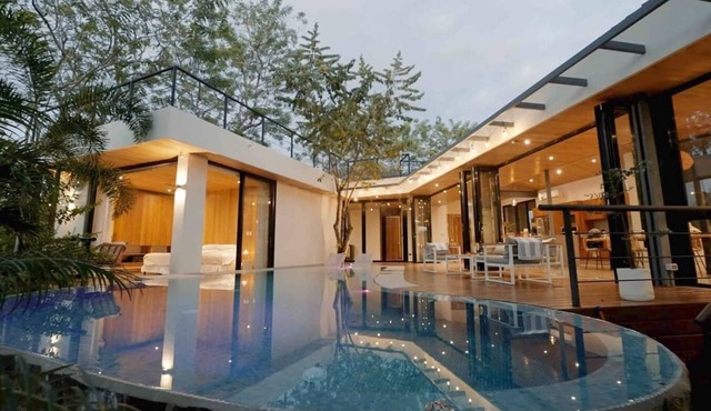 Discover the essence of tropical living at Casa Las Abejas, a stylish villa with a private pool, spacious design, and lush surroundings.