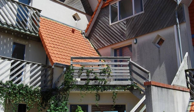 Ground floor apartment on the dike with sea views and south-west terrace