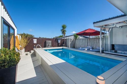 Sunkissed Pool Villa - Mangawhai Holiday Home
