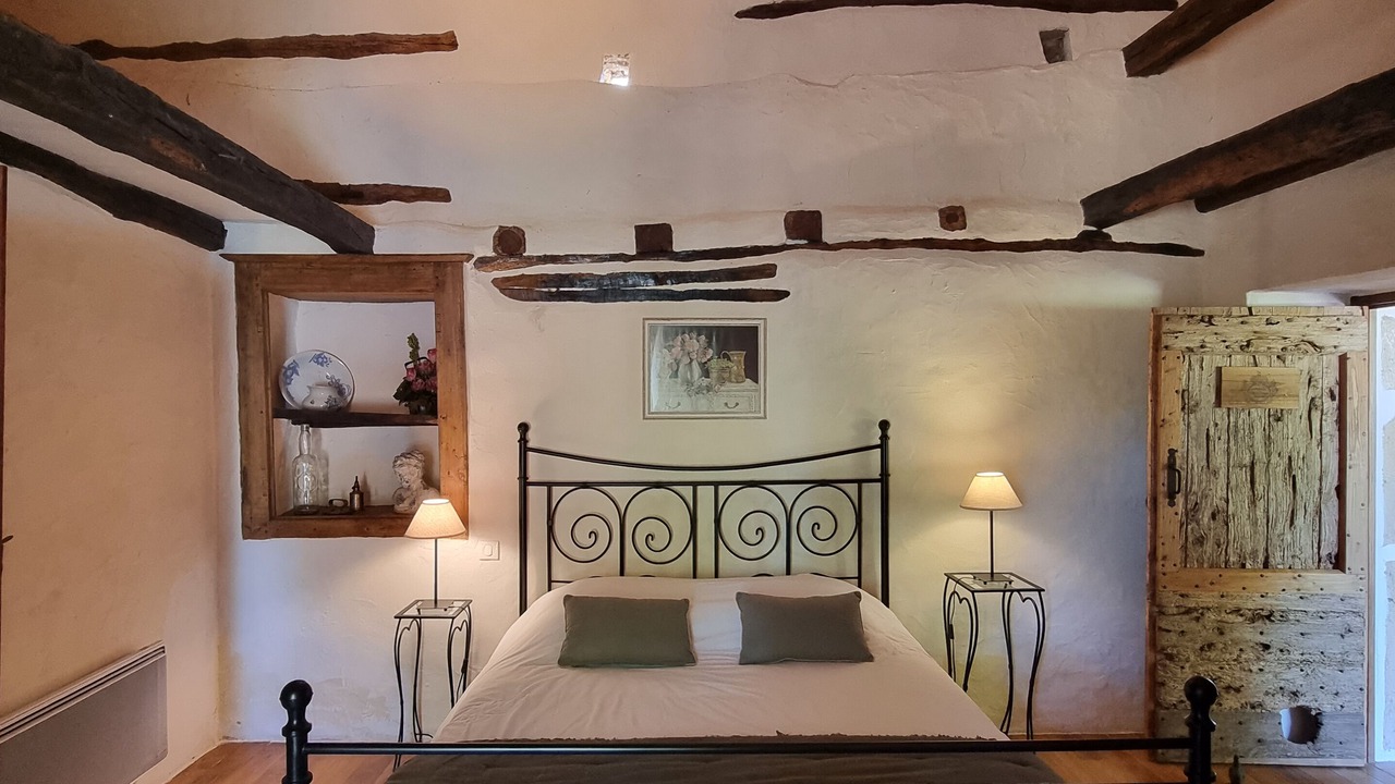 Photo of Bedroom in Saint-Cernin-de-lHerm