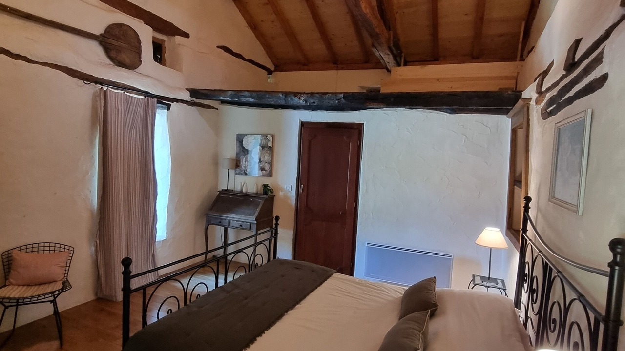 Photo of Bedroom in Saint-Cernin-de-lHerm